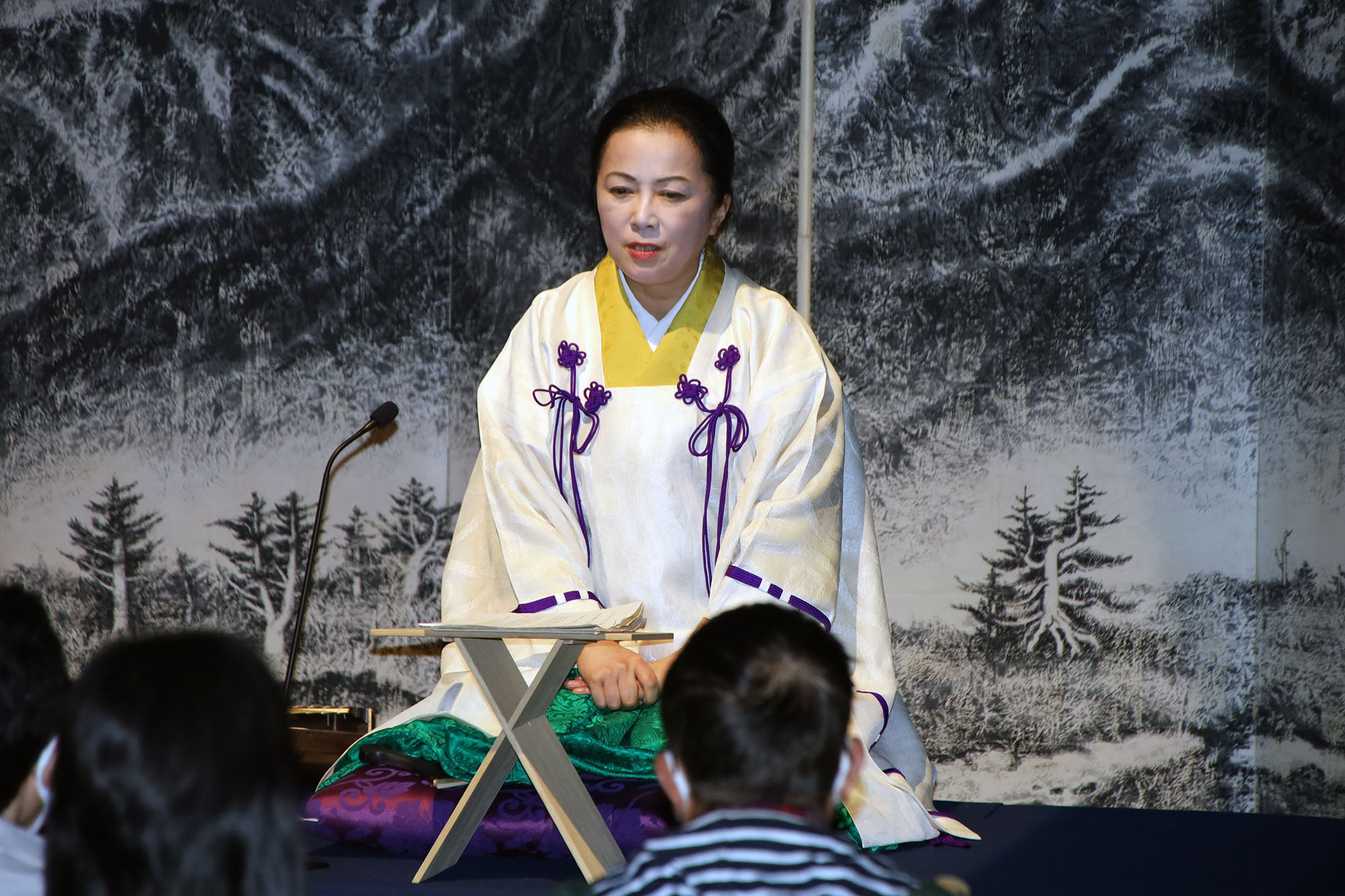 語る田中旭泉さん