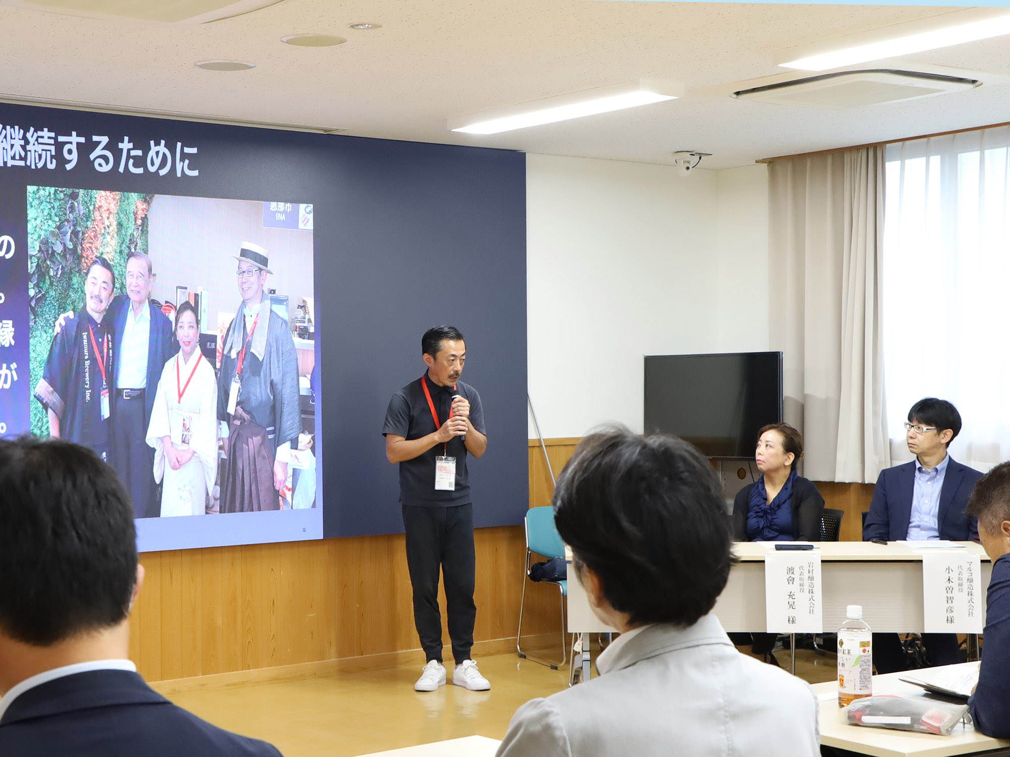 報告をする渡会さん