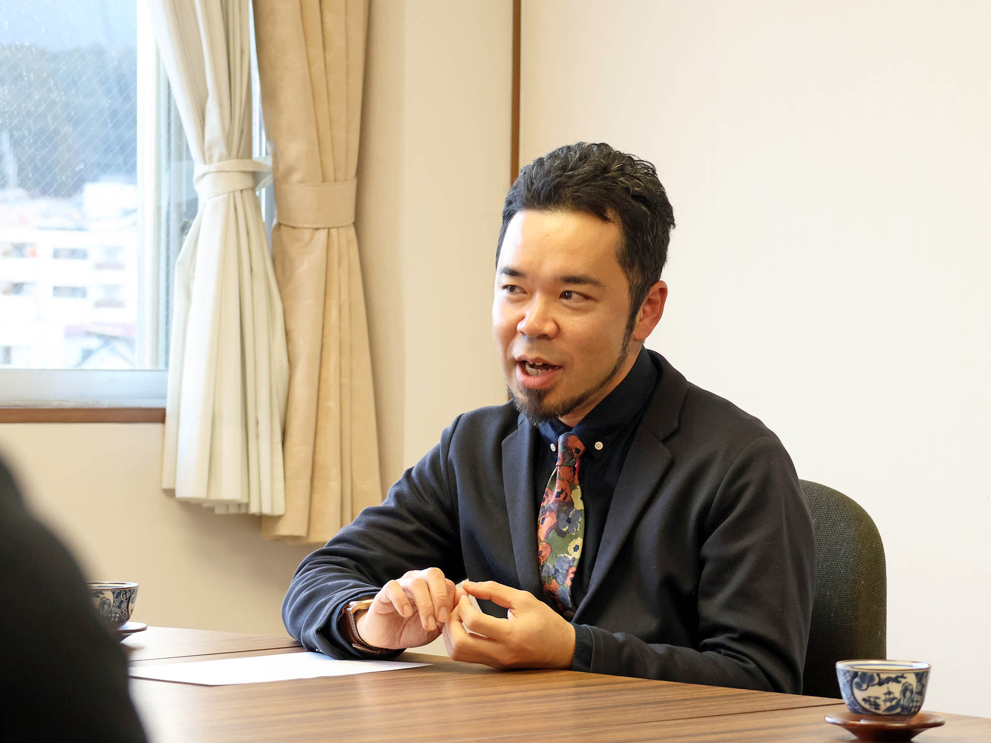 中野方町の魅力を語る相澤さん